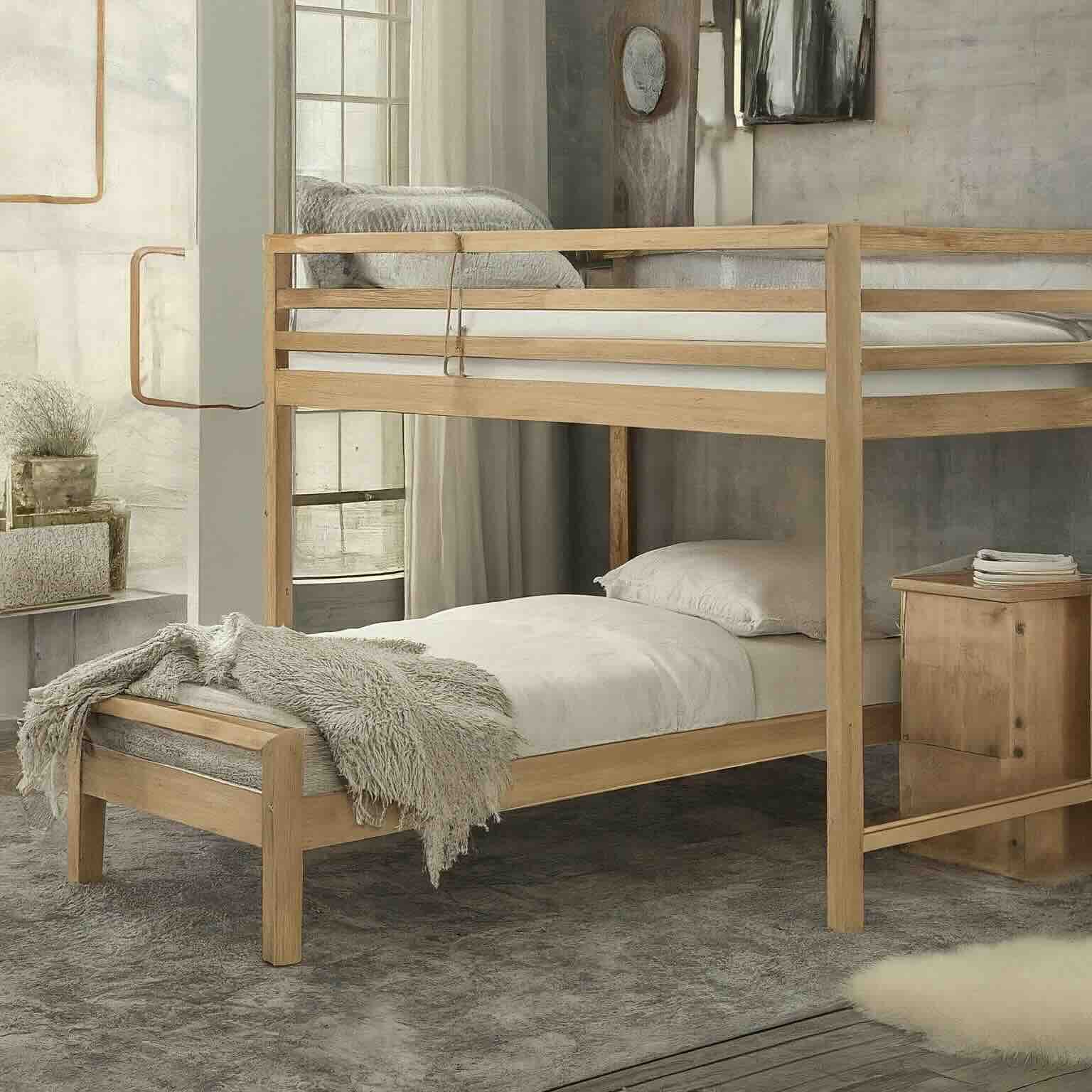 A bunk bed with a ladder and a bed, providing space-saving sleeping arrangements for multiple people.